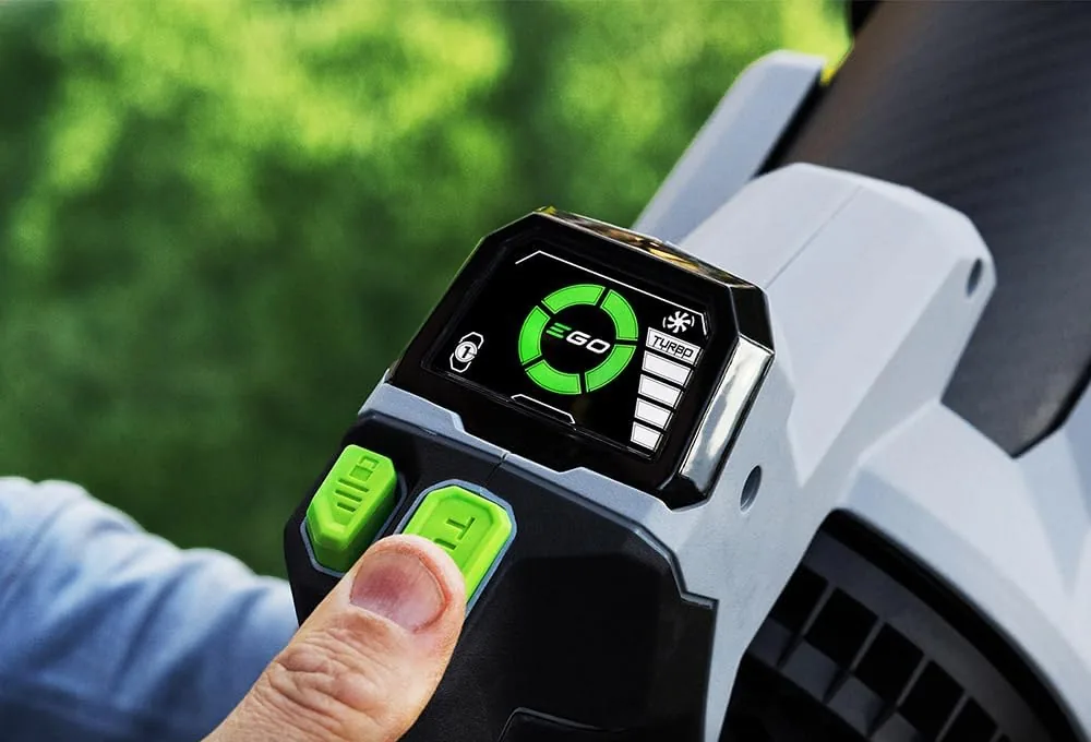 Thumb pressing a button beside the digital display on the EGO LB8803-2 leaf blower