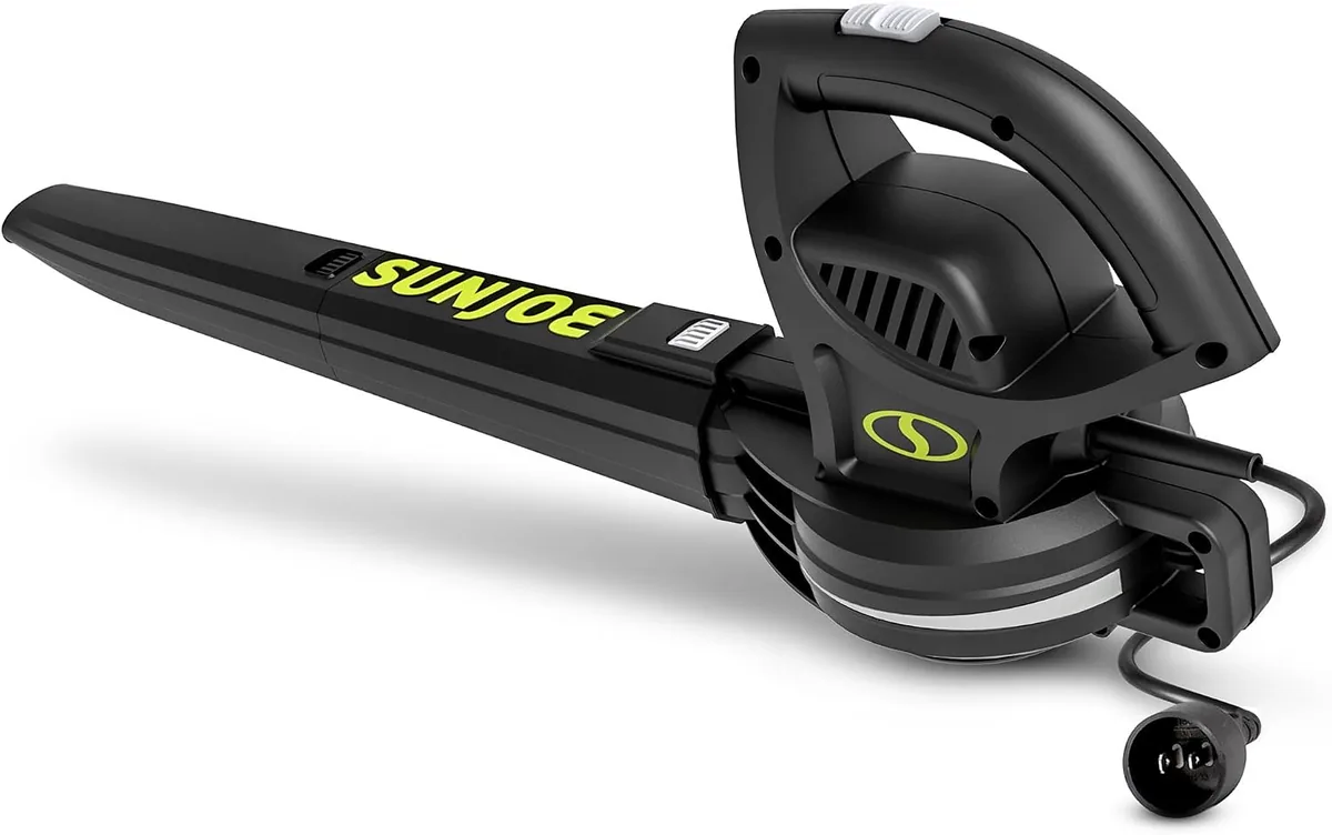 Sun Joe SBJ597E corded handheld leaf blower in black with a green logo on the nozzle