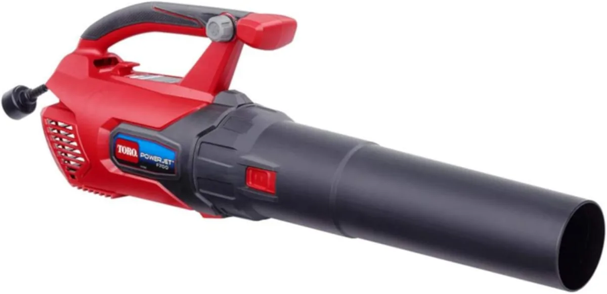 Toro PowerJet F700 corded leaf blower with red housing and black nozzle on a white background